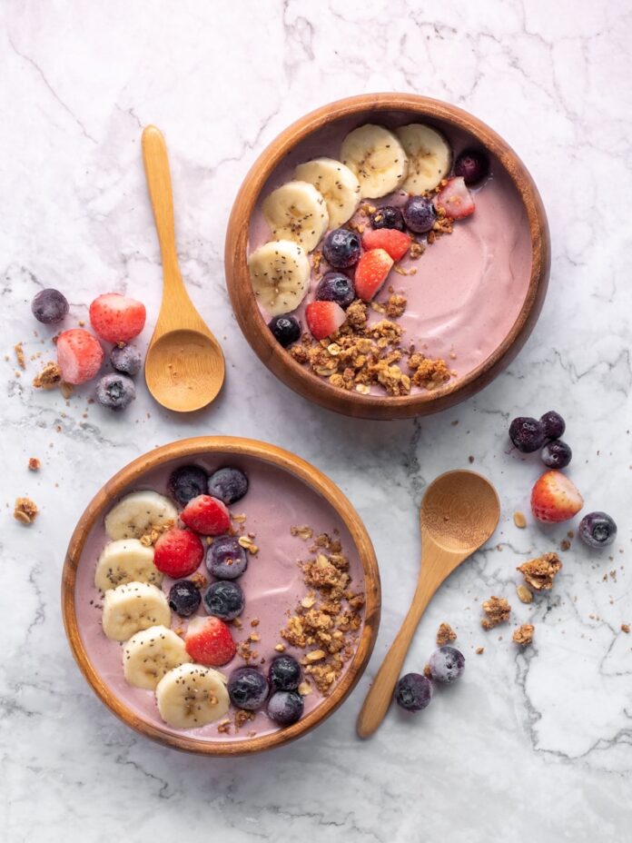 Photo by Vicky Ng brown wooden spoon on white ceramic bowl
