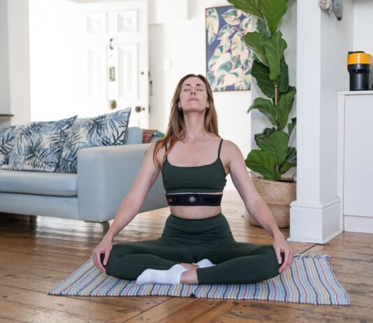 여성 건강관리, 작은 실천이 일상 속 변화를 만든다 a woman sitting on a yoga mat in a living room